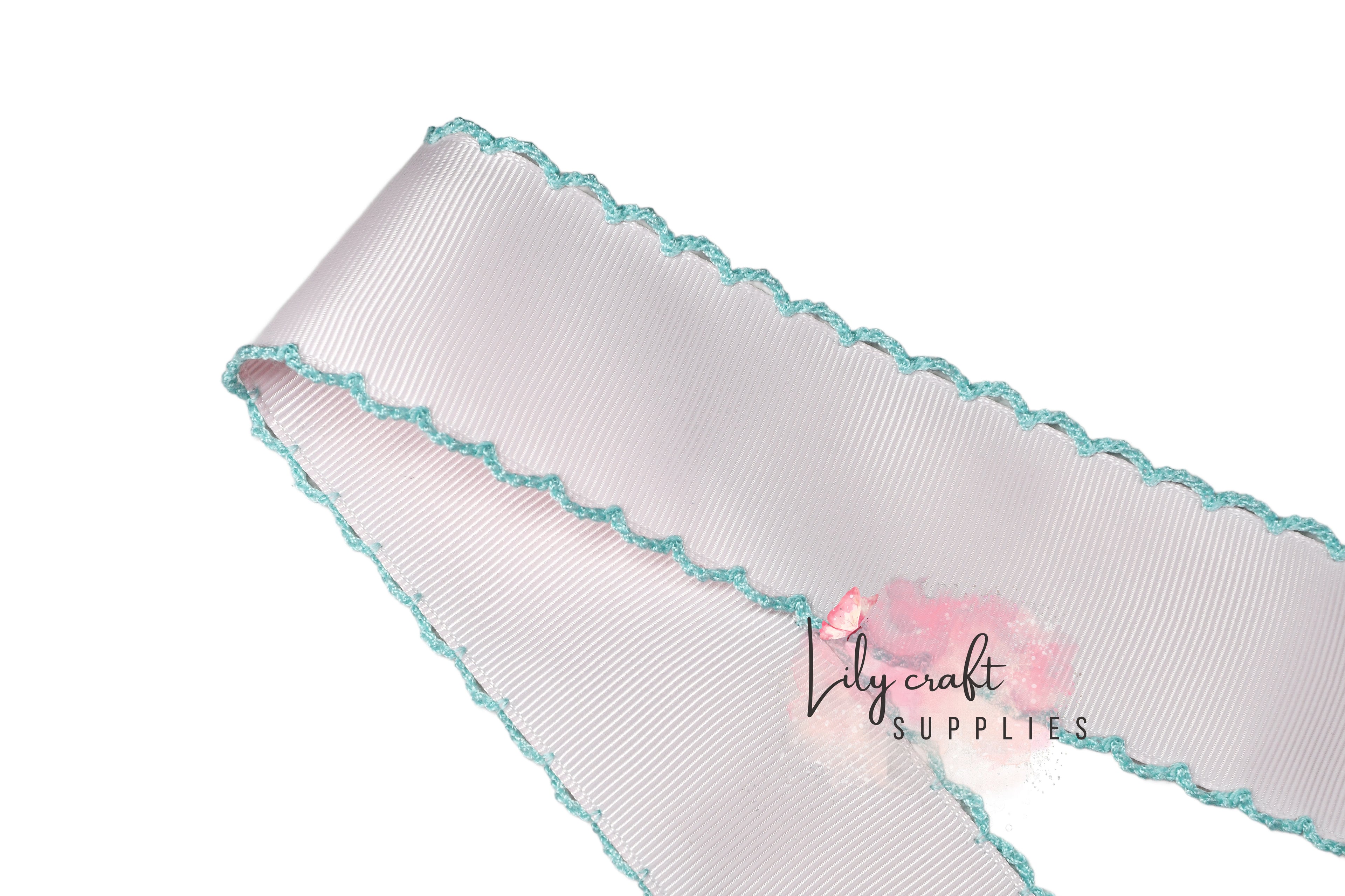 Light pink with aqua moonstitch