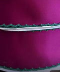 Dark red with green moonstitch