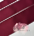 Dark red with matching moonstitch -Grosgrain