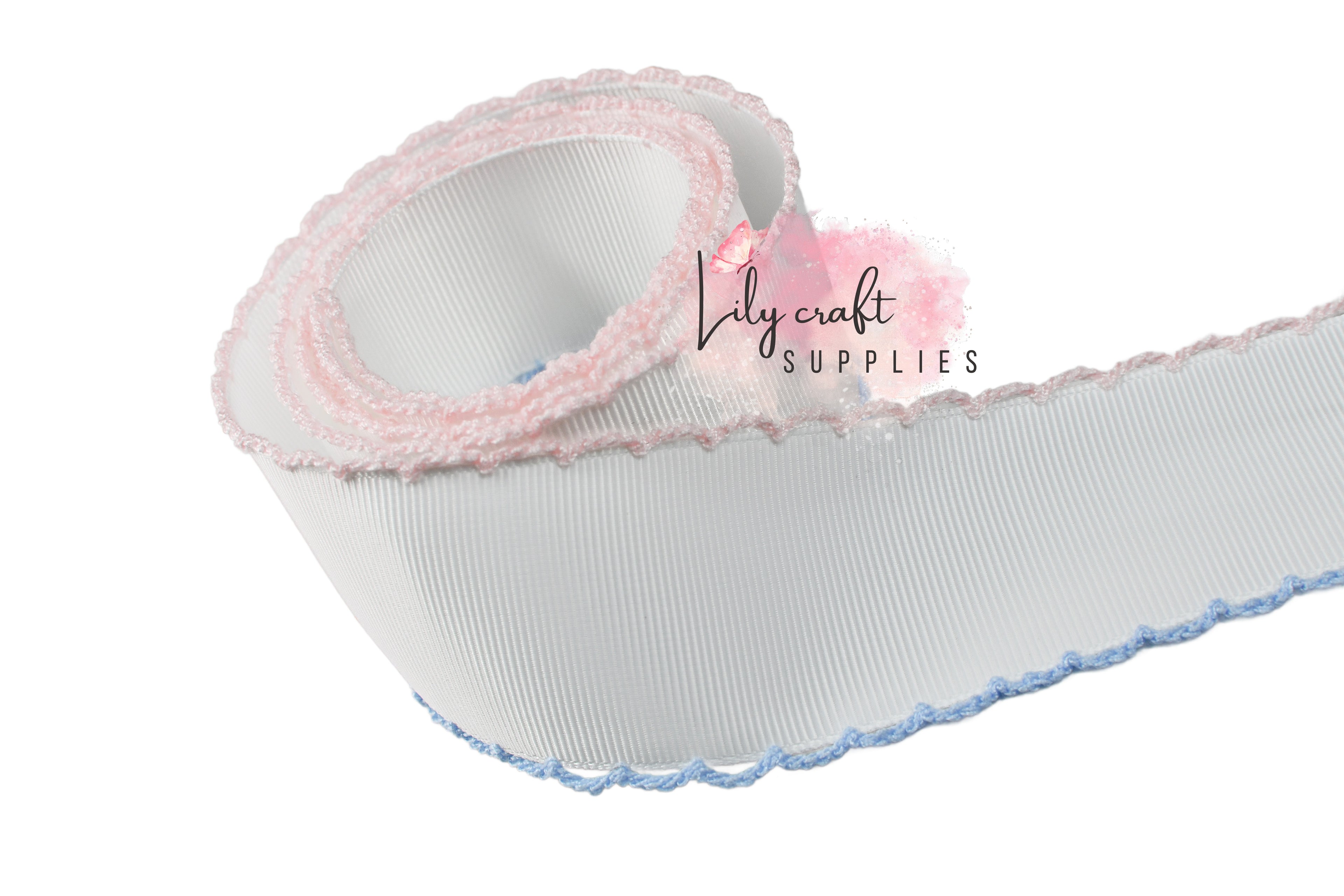 White grosgrain with Light blue and light pink moonstitch